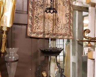 1863 Iron Horse kerosene lamp.... moves up and down on chain pulleys for light control.... Google search these guys!@