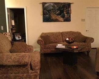 Very gently used sofa with chair and ottoman. Stone end tables.