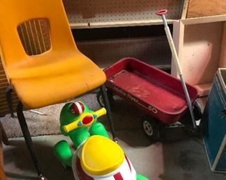 Radio Flyer wagon, school chair and swamp monster