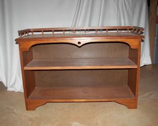 one of two mid-century low bookcases
