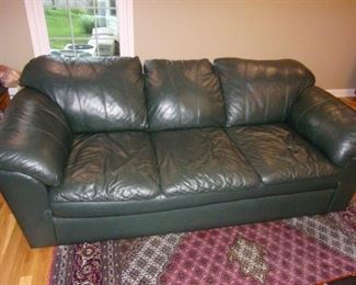 Matching "Faux" leather sofa and loveseat