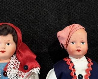 Antique bisque head and fabric body dolls.