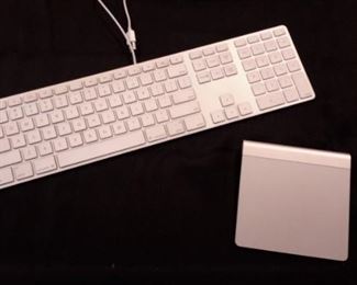 Apple wired keyboard A1243 and Apple wireless Magic trackpad. A1339