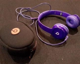 Beats headphones, purple, with case.