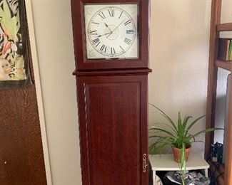 Clock storage cabinet
