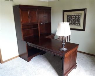 Cherry Office Ensemble- awesome home office! Features Partner Desk, Swivel Chair, and Matching File Cabinet! Adjustable shelving.  Can separate pieces for easy moving.  Dimensions: Partner Desk- 52" x 30".  Bookcase units are 32"w (each) x  79" h   (Note: lamp & copier not included)