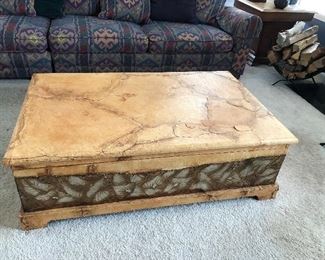 Leather covered Coffee table opens for storage