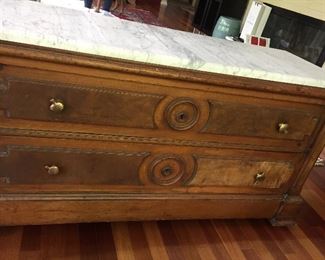 Low Victorian marble topped chest.