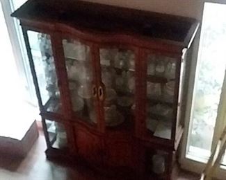 Martinsville fine lighted curio cabinet. 