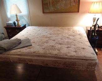 King sized mattress, box springs, and frame. Very reasonable price!