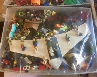 Large bins of Legos with Lego People