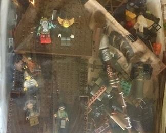 Large bins of Legos with Lego People