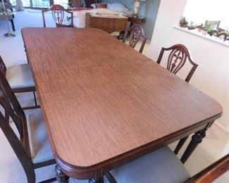 SOLD Gorgeous  pc burled mahogany dining room set: Buffet 66"W x 20.75"D x 37"H, Dining room table with leaf & custom pad 41.5"D x 79"W x 30"H (6) padded seat chairs (1) arm (5) side