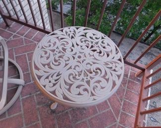 5 pc taupe painted outdoor cast iron patio set (1) Rocker chair (2) arm chairs (2) 21" diameter tables