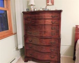 4 pc matching solid mahogany bedroom set Tall 7 drawer chest of drawers 38"W x 21"D x 54.5"H,  Dresser with 12 drawers & glass top : 5' W x 20.5"D x 34.5"H Full sleigh bed head & foot boards Head: 56.5"W x 41.5"  Foot: 56.5W x 26"H Wall mount Mirror: 4'W x 31.5"H