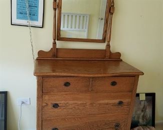 Antique burled solid wood 4 drawer dress with attached mirror   Dresser: 36"W x 19.5"D x 35"H    Mirror: 34" x 30-5/8"