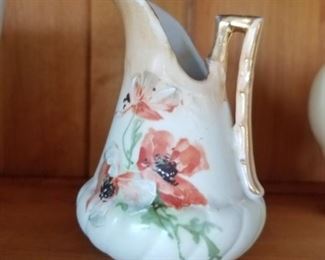 Upscale painted pitcher