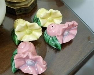 Two sets of floral salt and pepper shakers