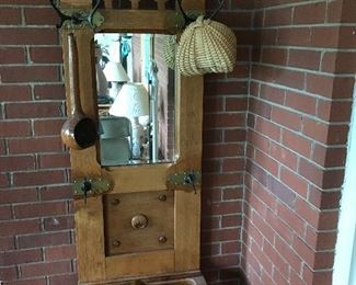 Nice sized hall tree with umbrella stand.