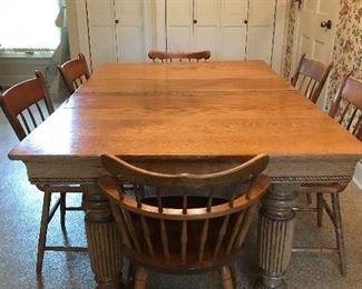 Nice table , miscellaneous chairs. The table has two leaves