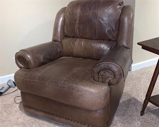1 of 2 matching leather recliners 