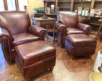 2 Like New Walter E Smithe leather chairs each with it's own ottoman and vintage side table 