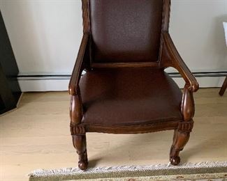 Mahogany brown leather and wood arm chair