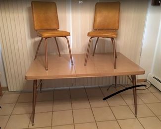 Formica table with one leaf and two chairs