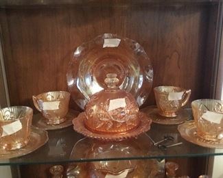 Items in cabinet - most all pieces are Jeanette Amber Glass