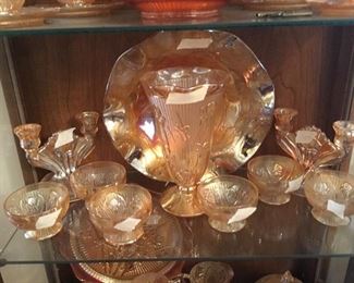 Items in cabinet  - most all pieces are Jeanette Amber Glass