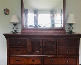 solid wood chest with locking storage and hidden storage for jewelry behind mirror. This is a lovey piece