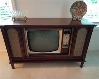 TV in cabinet with sliding  doors