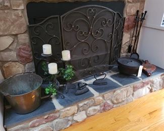 Brass kettle, flat irons, spider fireplace  cooking pot with lid....also found a tea kettle and pot
