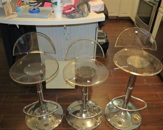 4 LUCITE BAR STOOLS.  ONE STILL IN THE BOX.