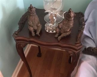One of a pair of tables and a pair of bears