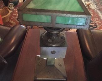Antique oil lamp with slag glass shade