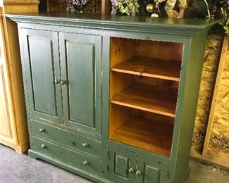 Distressed painted green cabinet