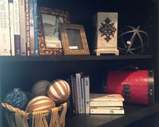 Books, frames, and decorative items