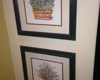 Two of three companion framed and matted floral art