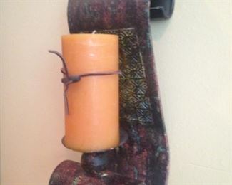 One of two wall candle holders