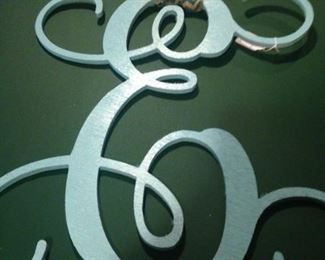 "E" wall art