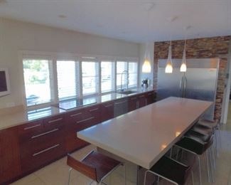 cherry kitchen cabinets , granite counter tops , stainless steel refrigerator , dishwasher , double oven subzero , wolf , 