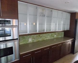 cherry kitchen cabinets , granite counter tops , stainless steel refrigerator , dishwasher , double oven subzero , wolf , 