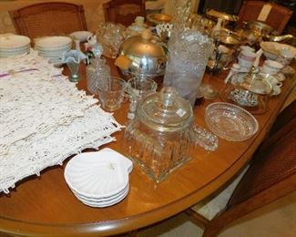 Vintage apothecary/candy jar. Lots of vintage glass and serving pieces. 