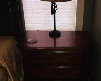 pair of beautiful bedside tables and matching lamps