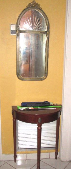 toledo half moon table with mirror in hall