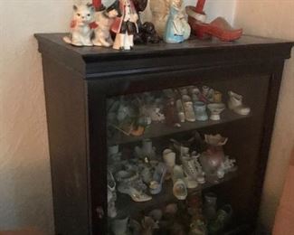 Display cabinet w/ceramic miniature shoe collection