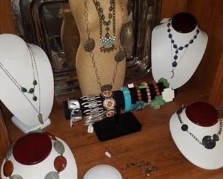 Jewelry & jewelry displays. These pieces are from Kimberly's Antiques. Mini mannequin display and necklace displays, bracelets, & necklaces.
