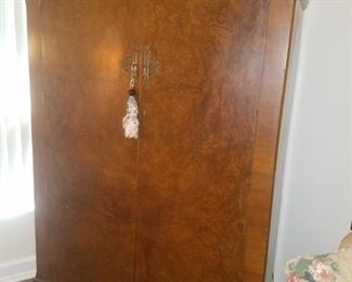 Antique chifforobe/wardrobe (back out to convert to entertainment center.