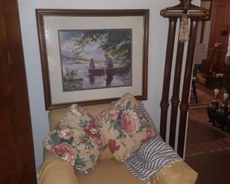 Beautiful floor lamp, framed art, and accent chair/pillows